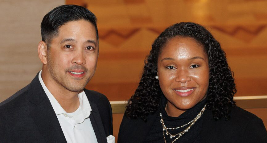 Carol J. Sharp and Michael V. Borromeo standing together smiling