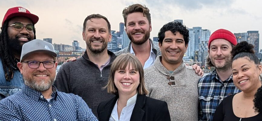 Members of the Washington Maritime Blue standing together smiling