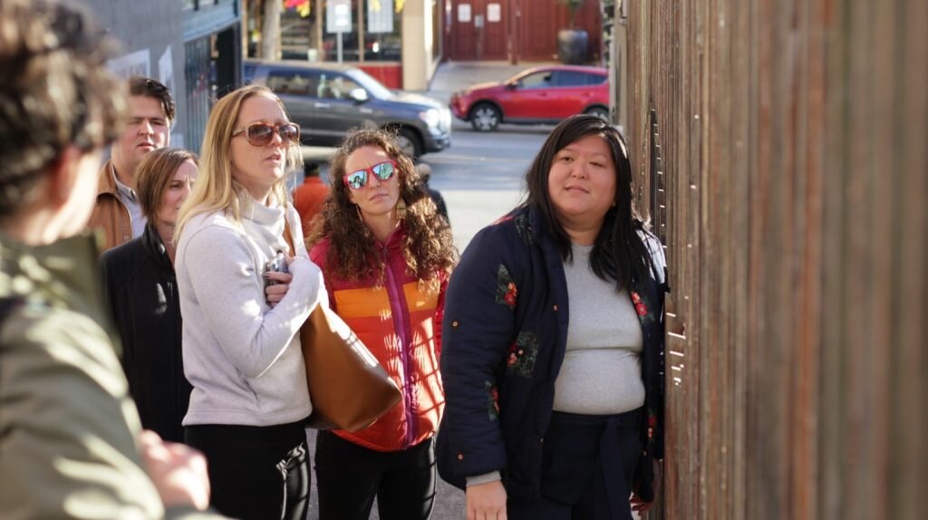 Jamie Lee standing with a group of people