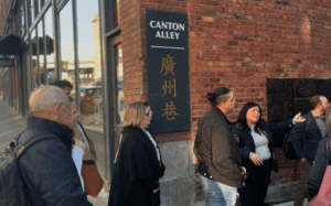 Group of people standing in Canton Alley