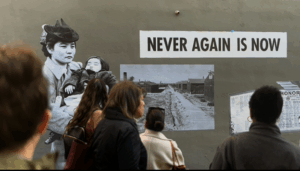 Group of poeple standing in front of collage