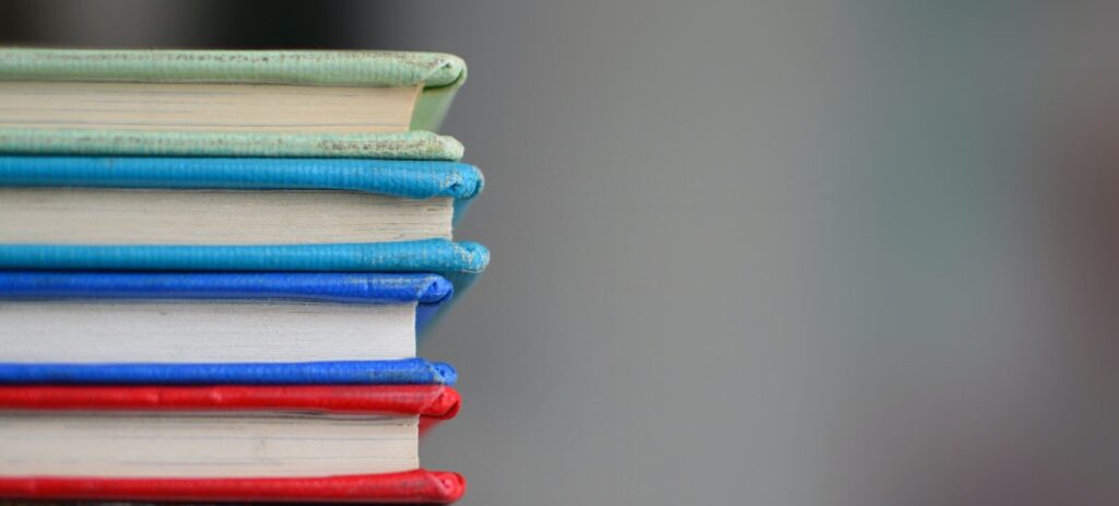 a stack of colorful books