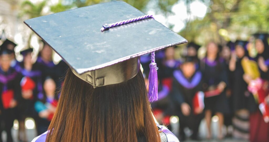 Girl in graduation gown and cap