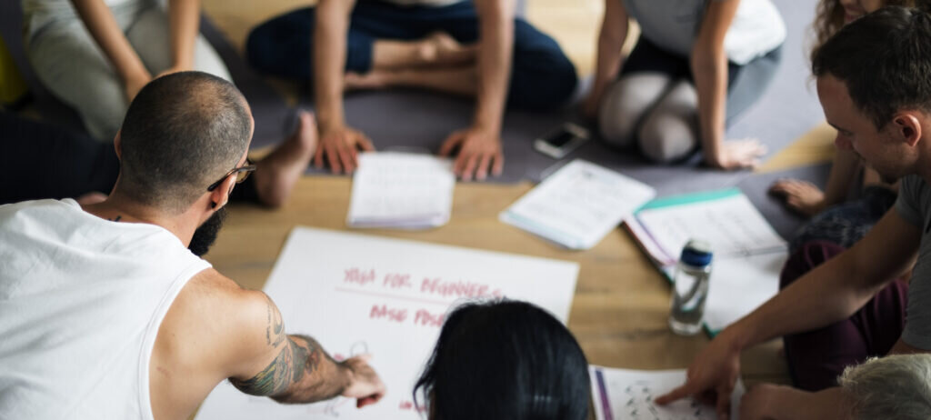 Group of people doing yoga together