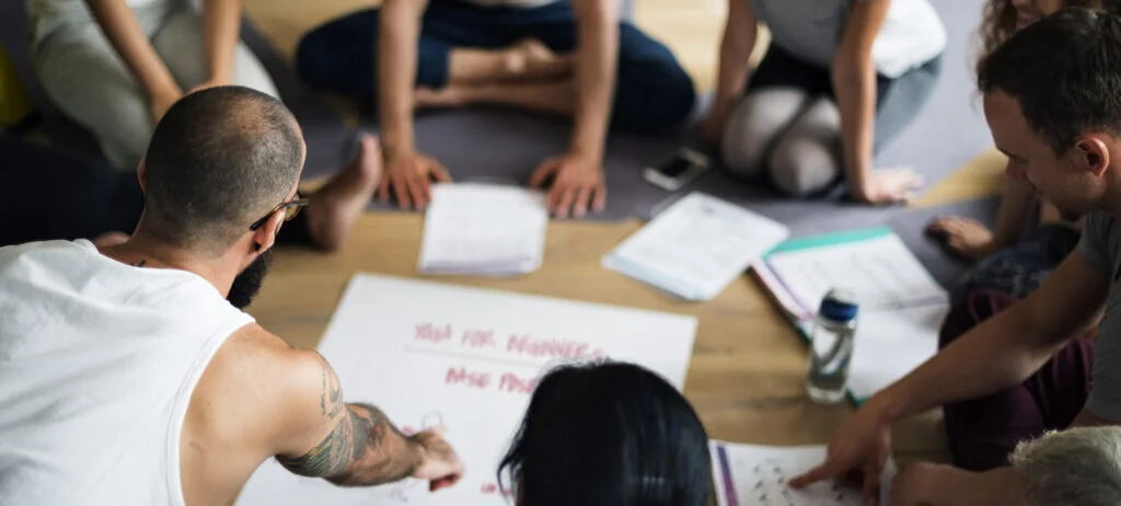 Group of people doing yoga together
